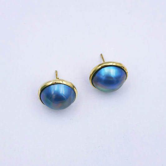 Pair of 9ct yellow gold stud earrings with round peacock blue/grey marbe pearls (12mm diameter) in classic gold frames with butterfly backs.