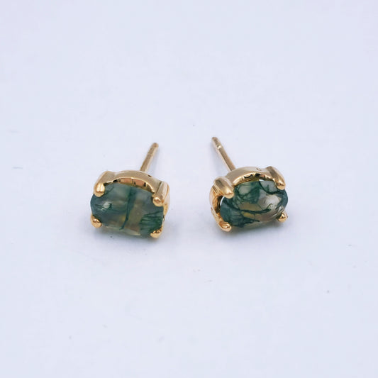 Pair of 9ct rose gold stud earrings featuring oval moss agate stones (7mm x 8mm) with soft green and moss-like inclusions, in classic four-claw settings.