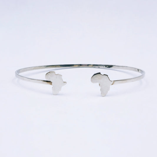 Sterling silver open bangle featuring cut-out Africa shapes at each end, 65mm adjustable diameter
