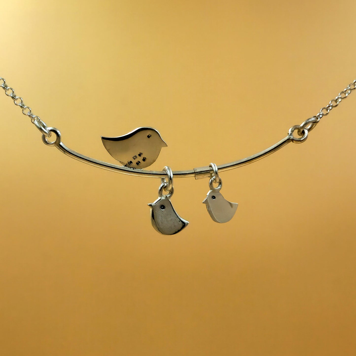 Handmade sterling silver mommy necklace with fixed pendant and two chic baby pendants, suitable for engraving initials.