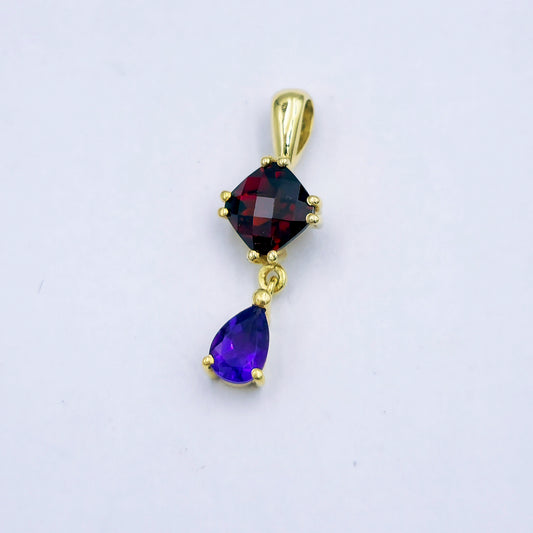 18ct yellow gold pendant featuring a cushion-cut 6mm garnet and a pear-shaped 6mm x 4mm amethyst, both in claw settings; dangle-style design, approx. 1.7g.