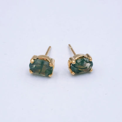 Pair of 9ct rose gold stud earrings featuring oval moss agate stones (7mm x 8mm) with soft green and moss-like inclusions, in classic four-claw settings.
