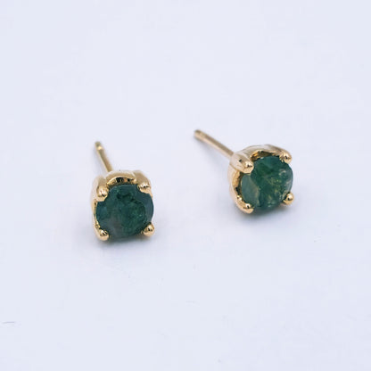 Pair of 9ct rose gold stud earrings featuring oval moss agate stones (7mm x 8mm) with soft green and moss-like inclusions, in classic four-claw settings.