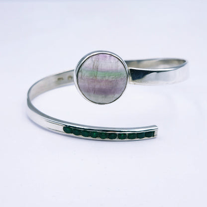 Sterling silver handmade open bangle with 20mm fluorite gemstone and channel-set green agates, adjustable size.