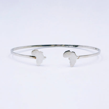 Sterling silver open bangle featuring cut-out Africa shapes at each end, 65mm adjustable diameter